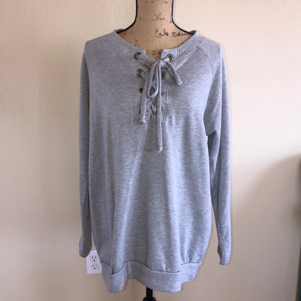 Lace up front sweatshirt.